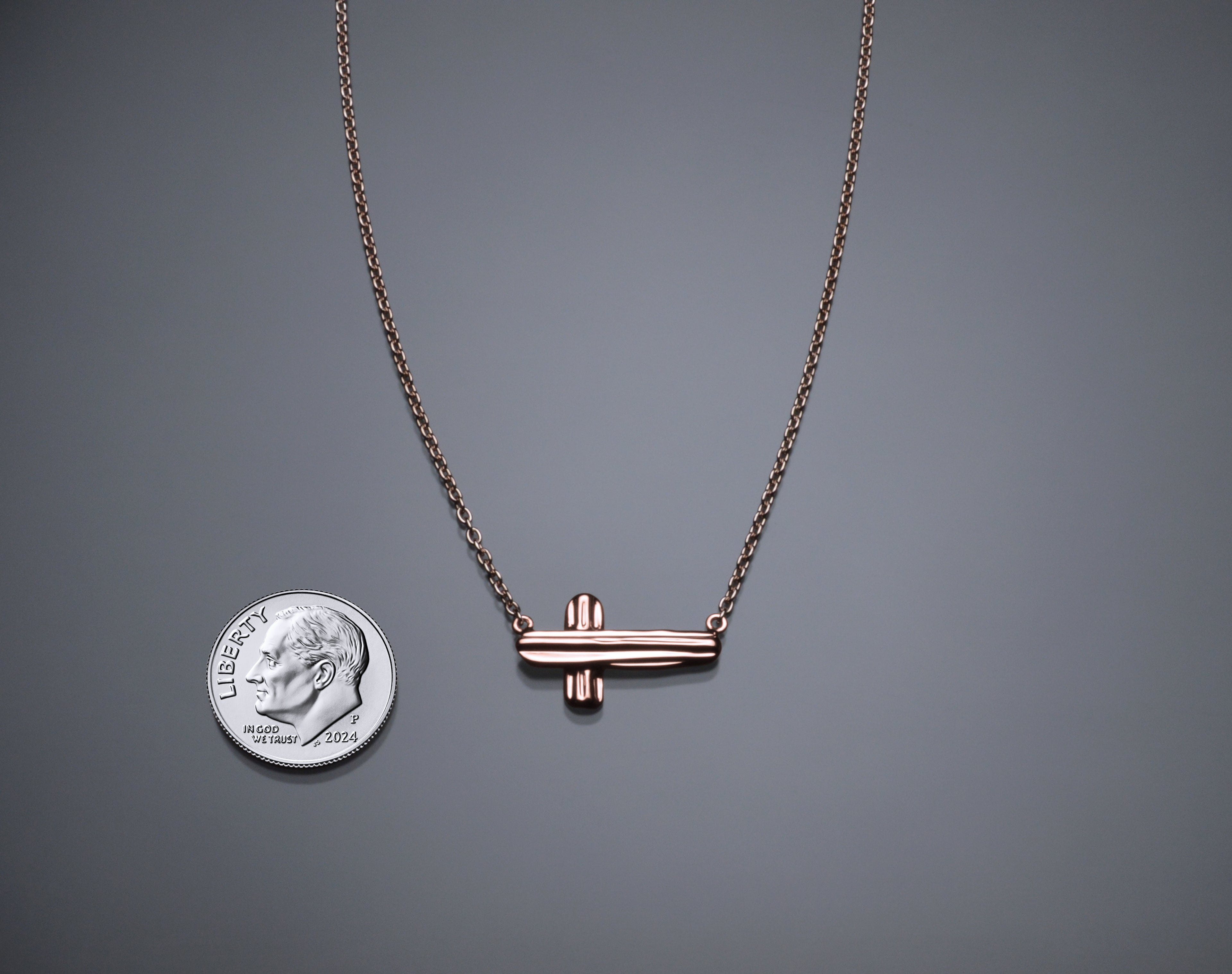 Gold Angel Hair V Strawcast Sideways Cross Pendant