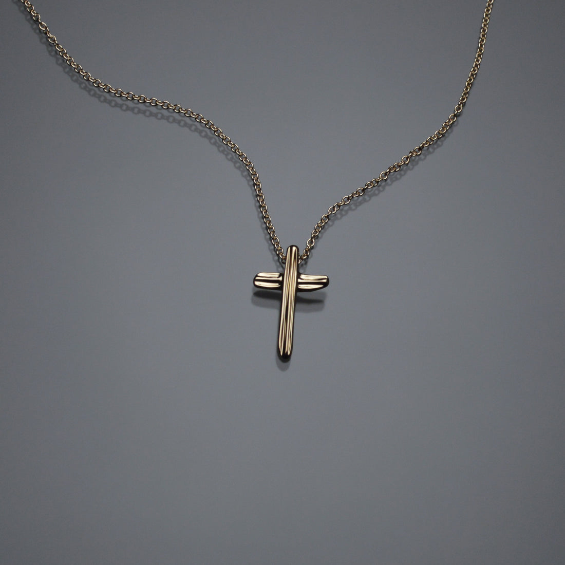 Gold Angel Hair IV Strawcast Cross Pendant