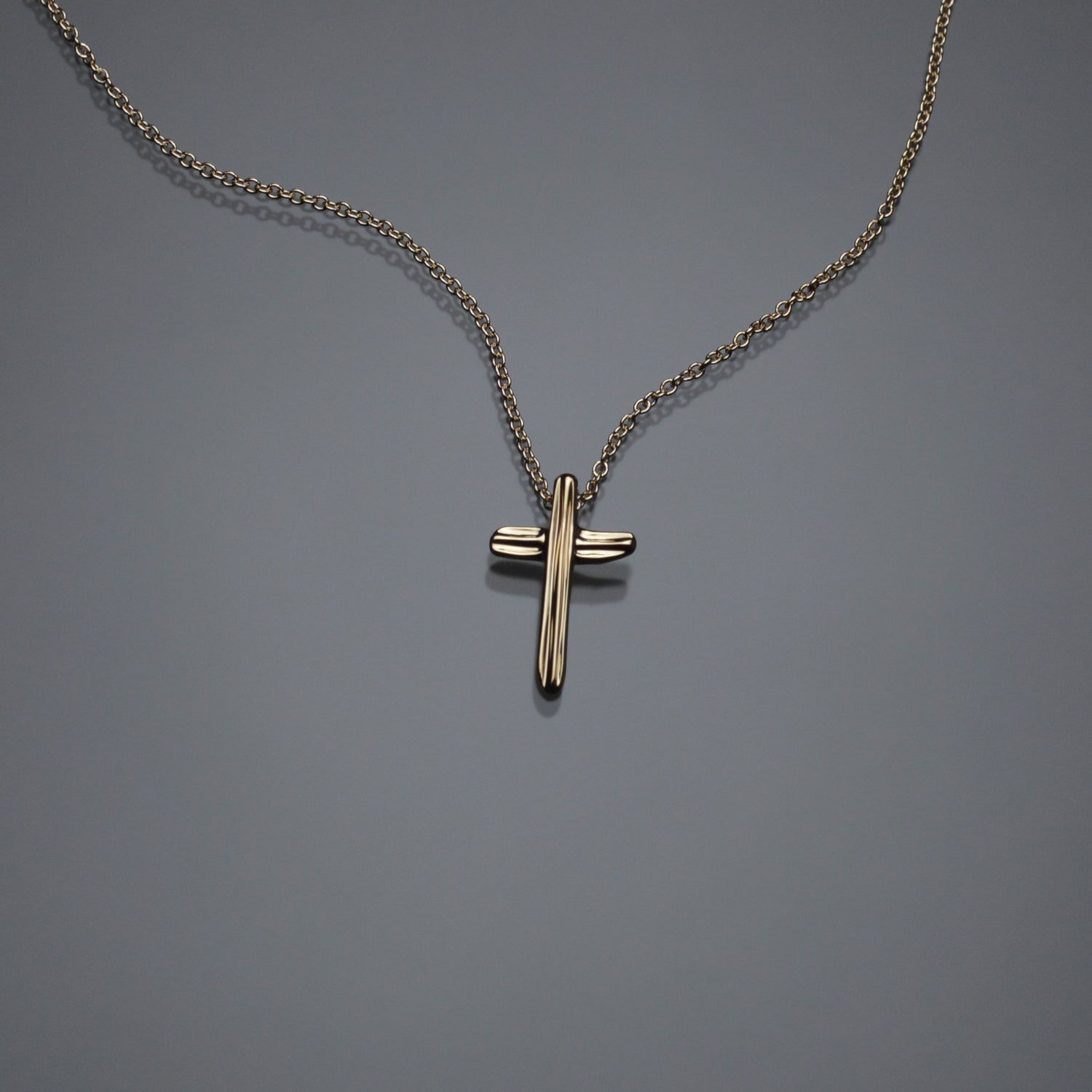 Gold Angel Hair IV Strawcast Cross Pendant