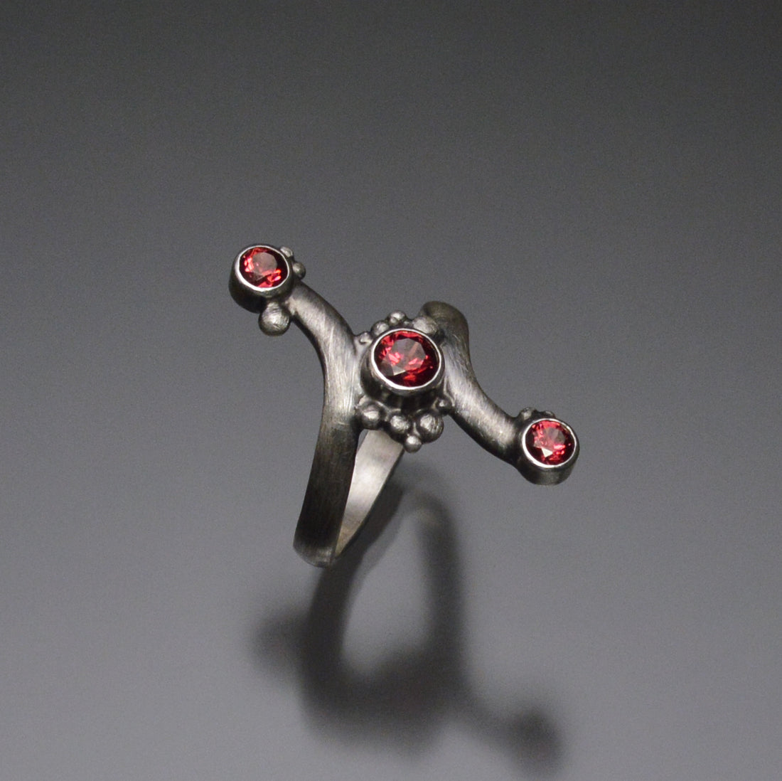 Bypass Ring with 3 Rhodolite Garnets