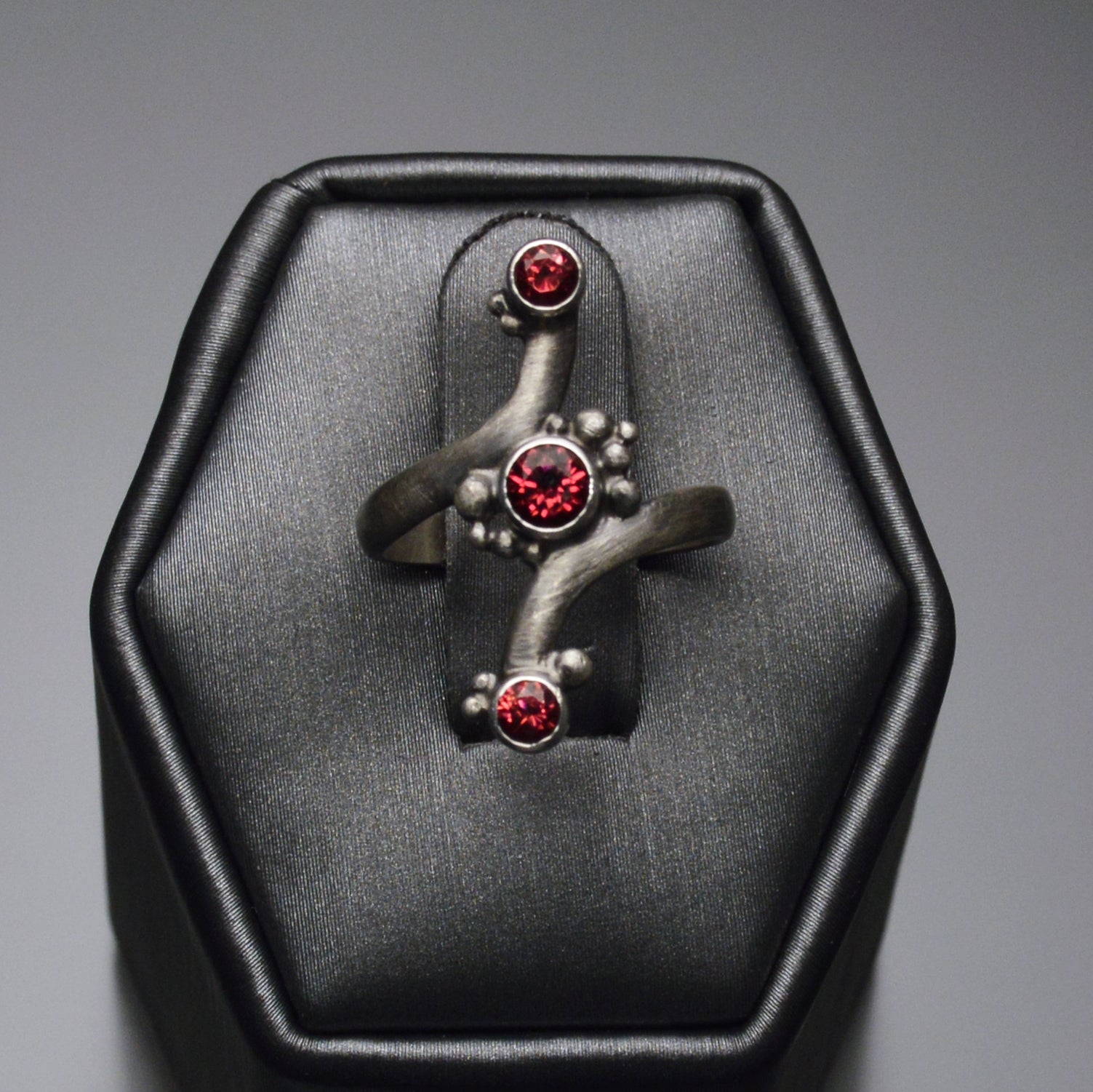Bypass Ring with 3 Rhodolite Garnets